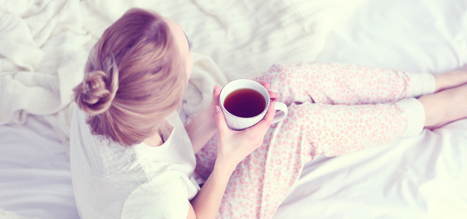 women in bed best sleep teas
