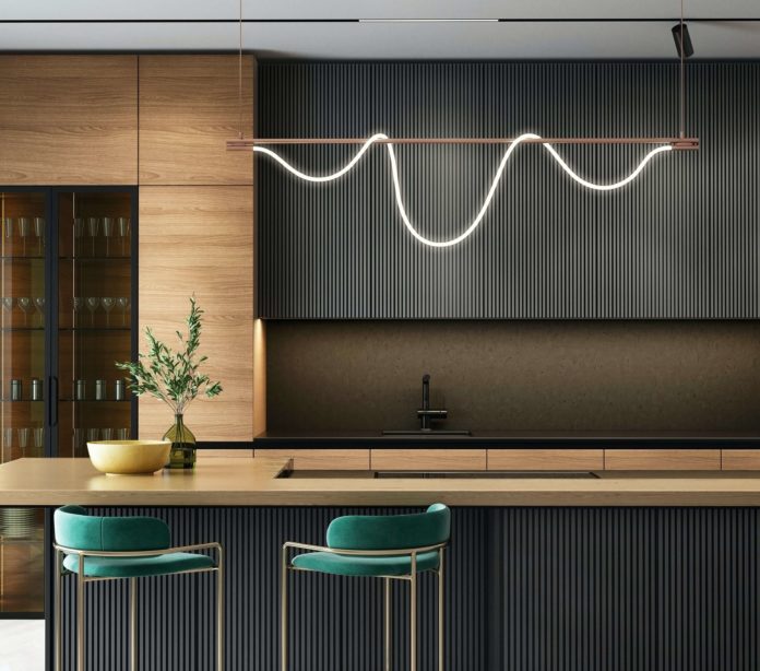 modern kitchen with wooden cabinetry and grey splash back and green bar stools