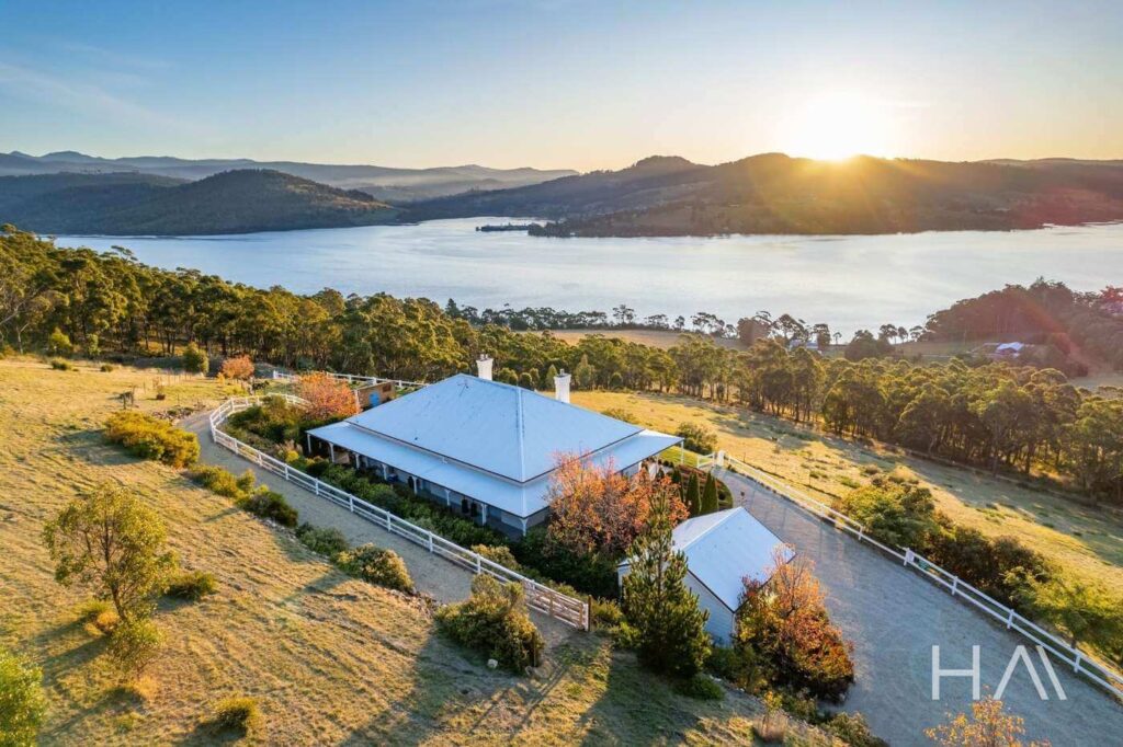 tasmania home on top of a mountain overlooking the water farm style country cottage renovated with modern charm